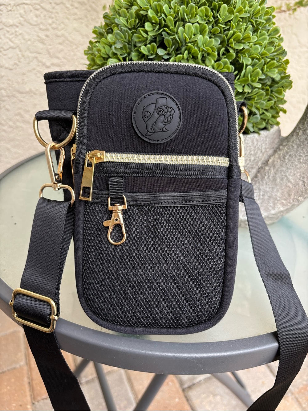 Buc-ee’s black Crossbody Bag with water bottle holder.